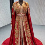 Red takshita with cape